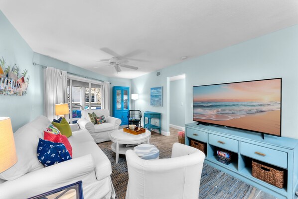 Welcome to Sea Breeze Retreat. Spacious living room has large Smart TV 