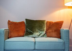 Comfortable Living Space featuring:
- Smart TV with Netflix
- Comfortable seating
- 1 Sofa Bed