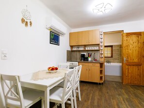 Table, Cabinetry, Furniture, Countertop, White, Chair, Wood, Lighting, Kitchen, Interior Design