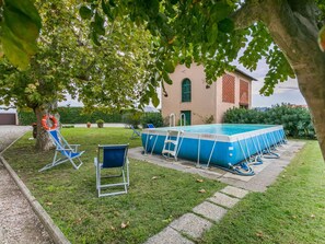 Plant, Building, Tree, Window, Outdoor Furniture, House, Shade, Land Lot, Grass, Leisure