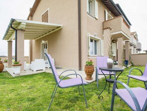 Plant, Building, Window, Chair, House, Shade, Land Lot, Outdoor Furniture, Residential Area, Wall