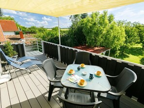 Plant, Furniture, Table, Property, Chair, Building, Shade, Flowerpot, Outdoor Table, Outdoor Furniture