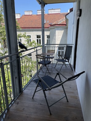 Furniture, Table, Window, Property, Chair, Building, Outdoor Table, Outdoor Furniture, Grass, Plant