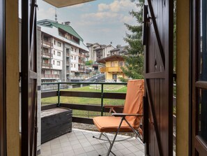 Building, Window, Plant, Sky, Shade, Interior Design, Cloud, Wood, Chair