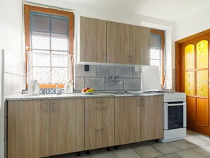 Cabinetry, Tap, Countertop, Kitchen Sink, Building, Sink, Window, Kitchen, Wood, Kitchen Stove