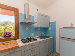 Cabinetry, Countertop, Eigentum, Möbel, Pflanze, Küche, Herd, Schublade, Küchengerät, Gebäude
