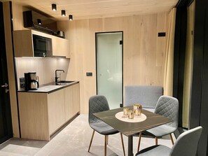 Table, Property, Furniture, Cabinetry, Chair, Wood, Interior Design, Flooring, Floor, Living Room