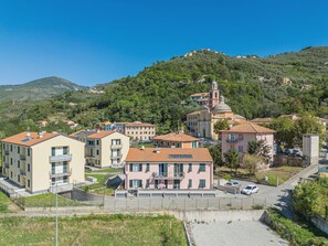 Sky, Plant, Property, Building, Mountain, Azure, Window, House, Tree, Neighbourhood