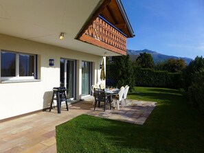 Sky, Window, Plant, Building, Shade, Tree, Chair, Residential Area, Table, Real Estate