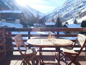 Table, Furniture, Cloud, Mountain, Property, Sky, Snow, Building, Chair, Tree