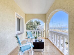 Sea, Porch, Balcony, Resort, Wood Stain, Villa, Baluster, Hotel, Outdoor Furniture, Handrail