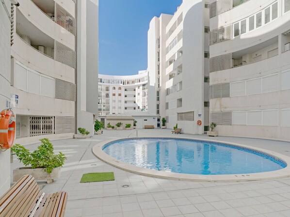 Water, Property, Azure, Building, Urban Design, Swimming Pool, Condominium, Real Estate, Composite Material, Leisure