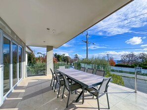 Sunny terrace with outdoor dining table for 8 people