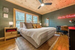 Welcome to your tranquil haven. Our spacious bedroom offers a plush king-sized bed, a sleek TV for entertainment, and a convenient desk for work or study. Tastefully decorated and painted, it's a cozy retreat designed for ultimate relaxation.