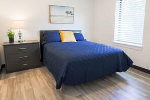 Queen bedroom with dresser & private en suite bathroom!