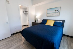 Queen bedroom with dresser and private en suite bathroom!