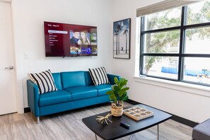 Comfortable living space with a sofa, 50" Smart TV!