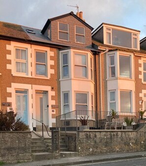 Beach Break. Decked area to the front.
Private parking immediately opposite.
