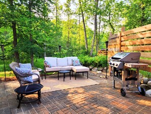 Private patio space with gas grill