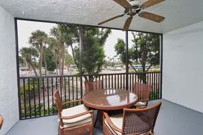 Screened lanai with dining table