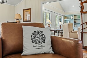 "Duck" the Dog welcomes you into his cozy Nest
