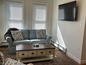 Comfy sun filled Living room with SmartTV