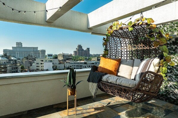 Experience the best view in town from your own personal swing chair!
