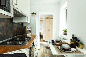 The kitchen is well equipped with everything you might need. From an oven & microwave, to pans & bowls.