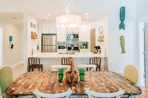 Charming Dining Table with Seating for 6 and Additional Bar Stools