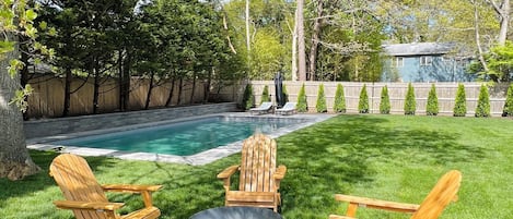 Fire pit and Adirondack chairs