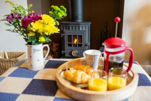 Breakfast tray and vase of flowers
