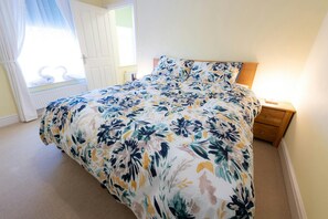 Super king bed room with large window