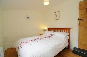 Oak floored double bedroom