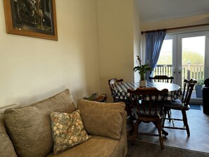 Sofa, cushions, dining area