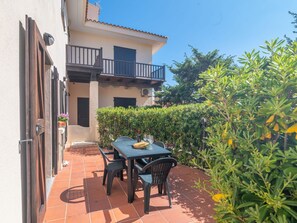 Sky, Property, Building, Plant, Table, Shade, Outdoor Furniture, Real Estate, Landscape, Leisure