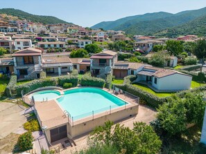 Water, Sky, Building, Property, Plant, Mountain, Swimming Pool, Azure, Tree, Architecture