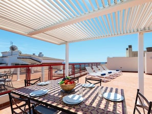Sky, Table, Furniture, Property, Chair, Azure, Shade, Flowerpot, Outdoor Furniture, Water