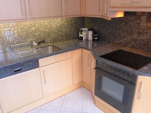 Brown, Kitchen Sink, Cabinetry, Countertop, Property, Sink, Tap, Kitchen Stove, Plumbing Fixture, Kitchen