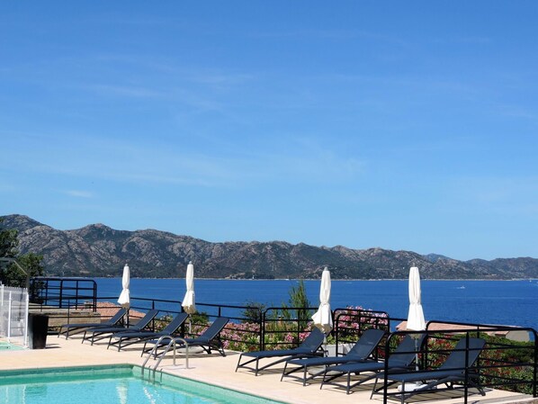 Water, Sky, Plant, Swimming Pool, Azure, Outdoor Furniture, Cloud, Sunlounger, Tree, Leisure