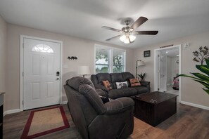 Living room and entry door.
