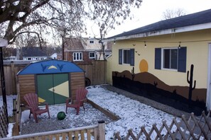 firepit area, shed and garage