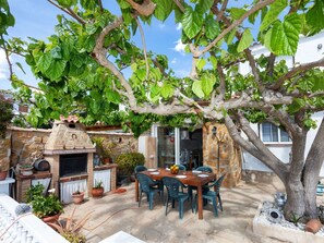 Plant, Sky, Shade, Table, Tree, Outdoor Furniture, Landscape, Outdoor Table, Facade