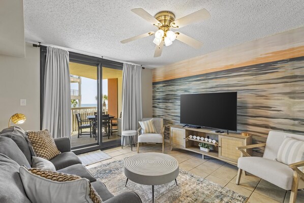 {LIVING ROOM} 58" Smart TV, ocean views and plenty of seating.