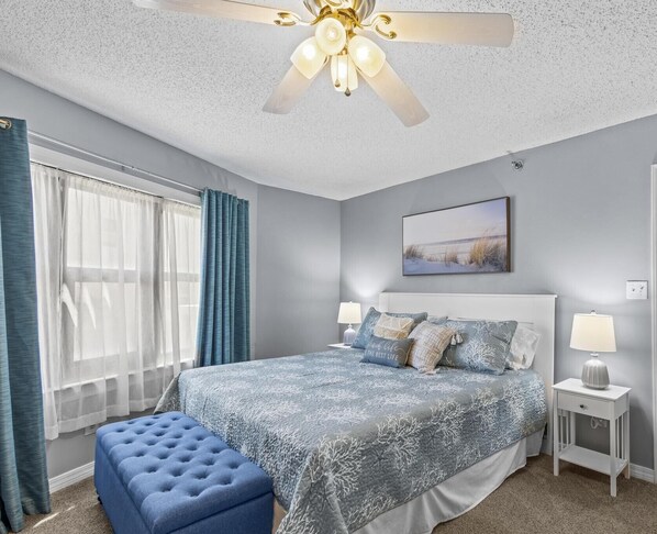 {MASTER BEDROOM} King bed, 50" smart TV & ensuite bathroom with walk in shower