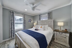 Comfort and luxury: queen bed with plush memory foam mattress for restful sleep.