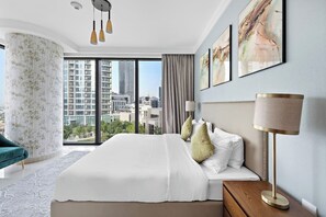 Bedroom Bliss: Stunning views from a stylish sanctuary, perfectly furnished for relaxation!