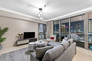 Living Room: Stunning views and sleek decor create the perfect space for relaxation and fun!