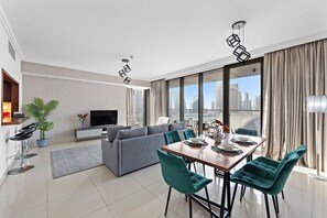 Living Room: Enjoy stunning city views from this stylish space, perfect for gatherings and relaxation!