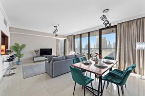 Living Room: Enjoy stunning city views from this stylish space, perfect for gatherings and relaxation!