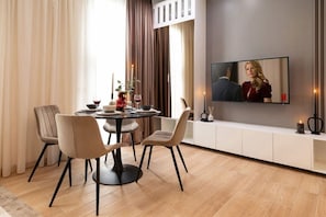 Savor every moment in our multifunctional living-dining space, where convivial meals and leisurely gatherings seamlessly blend together.